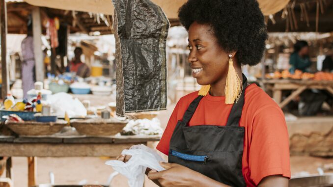 side-view-happy-african-woman-market